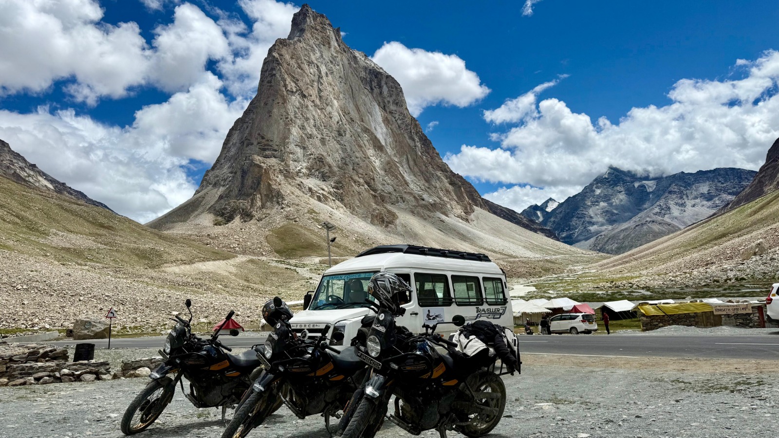 Motorcycles below a Zanskar mountain peak